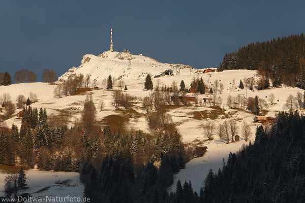 Kitzbheler Horn Gipfel Berghang Htten Schnee-Skipisten Snowboard-Arena in Abendlicht