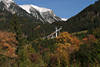 812813_ Oberstdorf Herbstlandschaft Blick auf Skischanze unter Allgäuer Alpen in Schnee
