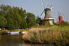802631_ Greetsieler Zwillingsmhlen Bild am Wasserkanal Tieflandschaft Foto Postermotiv aus Krummhrn