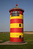 802648_ Pilsum rotgelb gestreifter Ottoleuchtturm Foto Krummhrn Ostfriesland Reise nah Greetsiel grner Deich Tieflandschaft