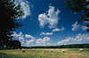 3663_Viehfutter Ernte Getreidestroh in Ballen Foto Stoppelfeld Panorama unter Schnwetterwolken