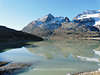 Lago Bianco Foto, milchiger Bergsee am Berninapass (Pso del Bernina)   grandiose Bergwelt Spiegelung im Gletschermilch