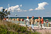 802850_ Pairs walk at Baltic Sea coast promenade, man & women walking photo