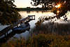 1103597_Seeuferromantik Naturfotos am Wassersteg: Frau im Boot, Sonnenuntergang Sterne in Blätter