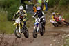 Motocross-Rennfahrer Spurt-Duell