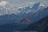 1202697_ Gleitschirmpilot in Bergpanorama Gipfel Flugbild Jof Fuart & Jof di Montasio Julische Alpenfoto Paragliding