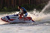 45578_Jet-ski Dynamik Foto in Spritzwasser Mann auf Motorrad, Freizeitsport Erlebnis, Jet Maschine