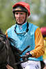 Torsten Mundry Foto Jockey Portrait im Pferde-Sattel nach Galopprennen