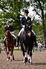 42328_Mann & Frau beim Training vor Dressurprfung, Reiter & Reiterin bei Pferde Dressur