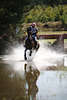 001397_Wrz Henning Vielseitigkeitreiter Foto Gelnderitt durch Wasser auf Pferd Landino 83