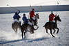 901440_ Snow-Polo Foto auf Schnee in St. Moritz, Polospieler & Polopferde dynamische Sportszene