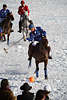 901448_ Richard LePoer Foto (Engländer in Julius Bär Poloteam) am Ball vor Publikum in St. Moritz Snow-Polo Turnierbild