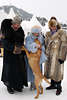 903047_ Polo-visitors joy with dog in St. Moritz Snow-Polo wintry event people photo