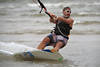 Brettsurfer Aktionportrt Kitesurf Wellenreiten Sportfoto in Meerwasser Nordseekste