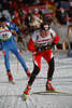 815206_Österreicher Sven Grossegger Foto im heimischen Hochfilzen vor Kosarac Nemanja im Laufbild Porträt auf Biathlonloipe im Stadion