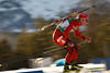 816703_Tora Berger action-photo Norway biathlete skiing-poster, dynamic speed on ski-loipe in back-light