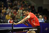 Chinesischer Linkshnder Xu Xin dynamische Ballannahme Pingpongstar efektvolles Tischtennis Aktionfoto