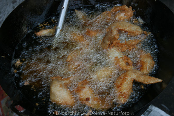 Hhnchenflgel in Blsschen knusprig in Thaipfanne gebratenes Geflgel