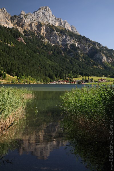 Haldensee Gipfel Bergkulisse Reflexion in Wasser Schiff Ufer Naturfoto 212992 Bild