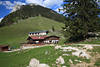 Wanderziel Ritzaualm Foto Berggasthof in Alpenkulisse Zahmer Kaiser Berglandschaft Bild