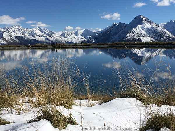 Alpensee Wasser Grser in Winterschnee Berggipfel Zillertaler Hochgebirge romantisches Naturbild