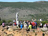 Bd0029_Pilgergruppe Foto am Marienerscheinungsort in Medjugorie felsiger Landschaft