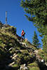 Alpspitze Steilsteig Wanderin in Naturfoto unter Gipfelkreuz Allgäuer Alpen
