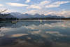 Forggensee Wasserlandschaft vor Alpengipfel Wolkenspiegelung