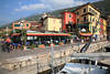 Castelletto Pizzeria Ristorante da Umberto in Hafen Gardasee Foto Boote bunte Häuser Bergblick