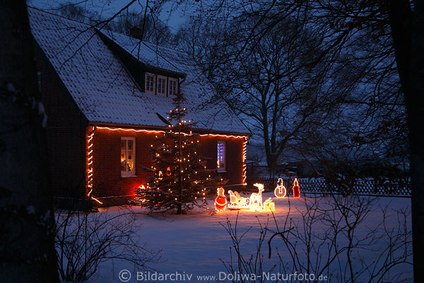Winter-Lichtdekor am Behringer Schmuckhaus Adventszeit blaue Stunde Nachtbild