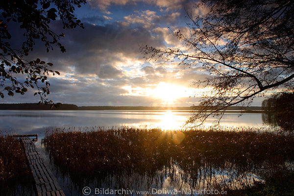 Sonnenaufgang Romantik Naturfoto Sonnenstern ber Wasser Krsten See in Morgensonne