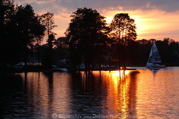Reichensee Sonnenuntergang Wasser Landschaft Masuren Abendstimmung Segelboot in Ostpreussen Mazury Bogaczewo