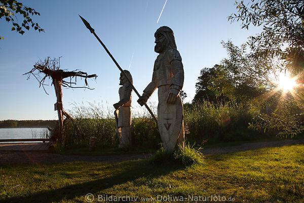 Masuren Galinder-Krieger am Seeufer in Sonne Stern Gegenlicht