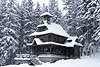 Jaszczur�wka Kapelle im Schneefall Winterbild Zakopane altes Bergleutestil Foto