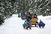 Schlittenfahrt Kulig Winterfoto Winterschlitten Schulkinder Klassenfahrt Ausflug in Natur