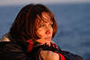 Frau Gesicht vor Meerwasser Fotomodel im roten Sonnenlicht