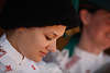 1102600_ Mädchen Gesicht aus Seis unter Schwarzmütze in Tracht Foto vom Dorffest in Kastelruth