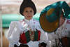 1102604_ Seiser Mdchen in Schwarzmtze, hbsche Tracht, Buntkleid Foto beim Dorffest in Kastelruth