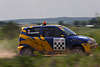 WRC Rally Team Lewandowski Kleinwagen Sportbild auf Rennstrecke in Naturlandschaft Masurens