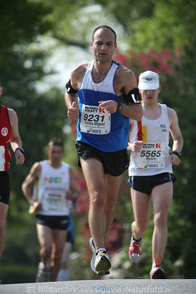 Marathonfoto Lufer Carlos Miguel vor Bjrn Laufbild aus Hamburg