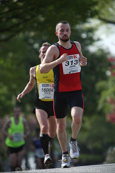 Joris Brandt Marathonfoto Hamburger SV Lufer Laufbild in Alsterallee