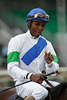 Eduardo Pedroza Starjockey Portrait zu Pferd La Bamba (von Samun-Loja) nach Sieg im Galopprennen