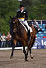 703080  Henschke Miriam auf Fairbanks in Dressurreiten Foto, Frau zu Pferd in Dressurkr