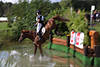 001986_Pferd Opgun Louvo Wassersprung Bild mit Amazone Sandra Auffarth Rereiten Bewegung Crossrittfoto
