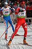 815198_ Schweizer Claudio BCKLI Foto im Skaterstil vor Slowenien MEHLE Joze im Worldcup Hochfilzen photo