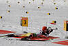 815450_ Schilderfeld Foto auf Biathlonschiessstand mit Biathlet beim Liegenschiessen in Bild