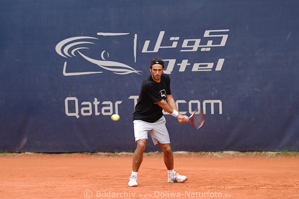 Tennis photo Ballannahme Ballabspiel auf rotem Sand