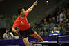 Penholder Xu Xin am hohen Ball akrobatische Tischtennis-Attacke Link-Schuss Aktionfoto