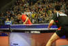 Tischtennis Matchbild Ovtcharov besiegt Chinesen Wang-Hao am Ball World-Team-Cup Fotografie