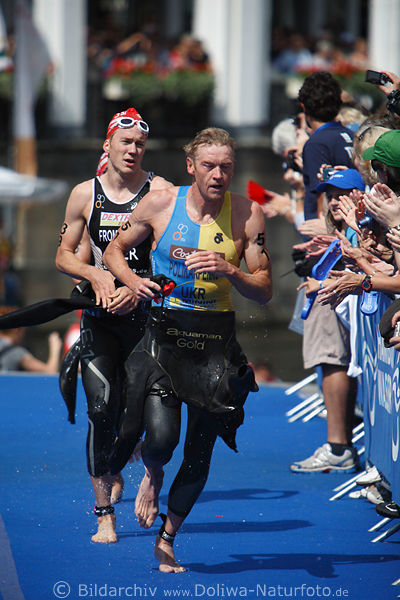 Ukraine Triathlet Volodimir Polikarpenko in Lauf vor Nils Frommhold aus Deutschland